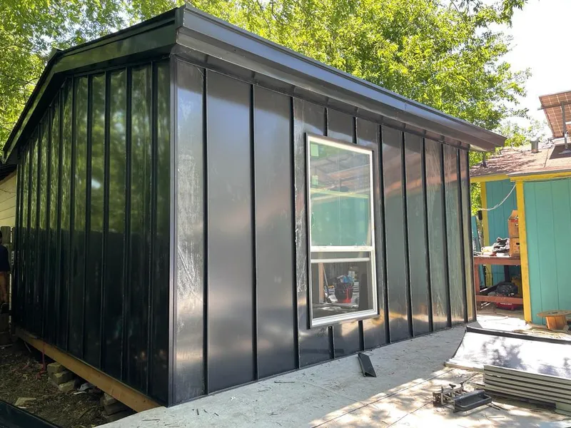 Black standing seam metal wall panels for Metal Roof Installation in Woodbury