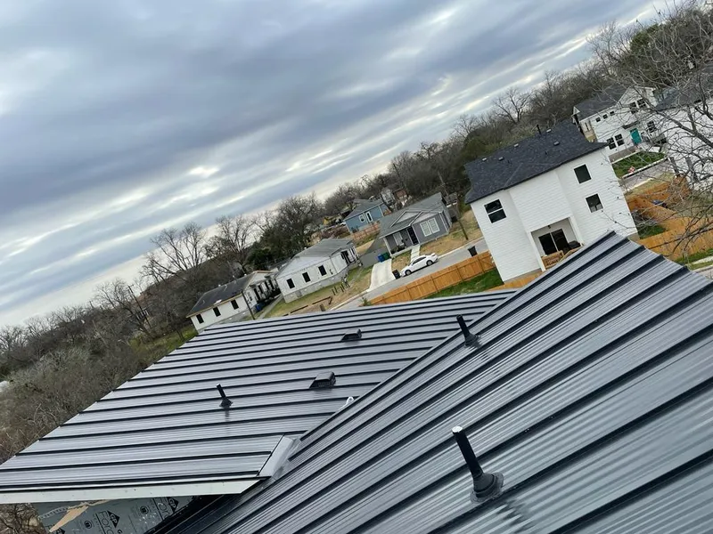 Standing seam metal roof panels with vents for Skylight Repair in Woodbury